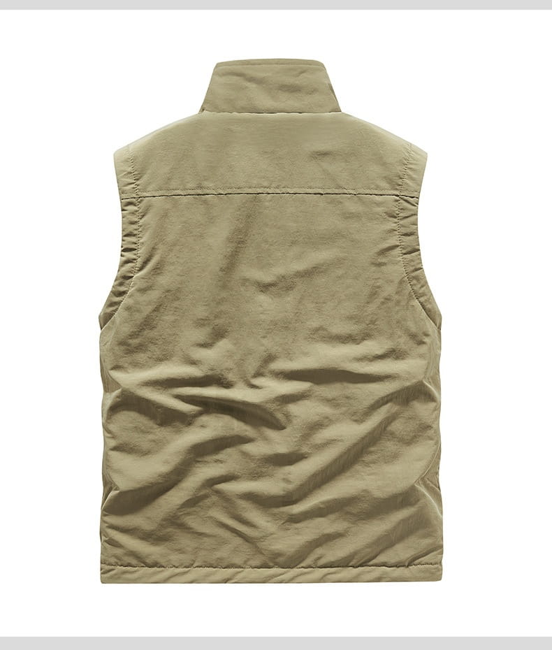 Men fleece cargo vest in khaki color featuring quilted sleeveless design with stand-up collar and stitched seams suitable for outdoor outerwear.