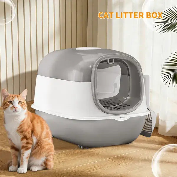 Modern gray and white plastic enclosed cat litter box with scoop and dual entry features a rounded design for efficient odor control and privacy.