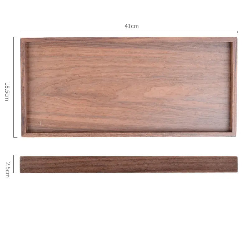 Acacia wood rectangular serving tray with a smooth natural wood grain finish and dimensions 41cm by 18.5cm by 2.5cm hand polished for elegant serving.