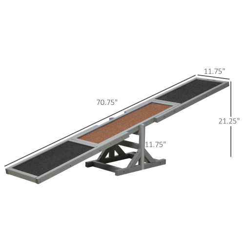 Gray metal dog ramp with black and brown textured surfaces for dog agility seesaw training equipment.