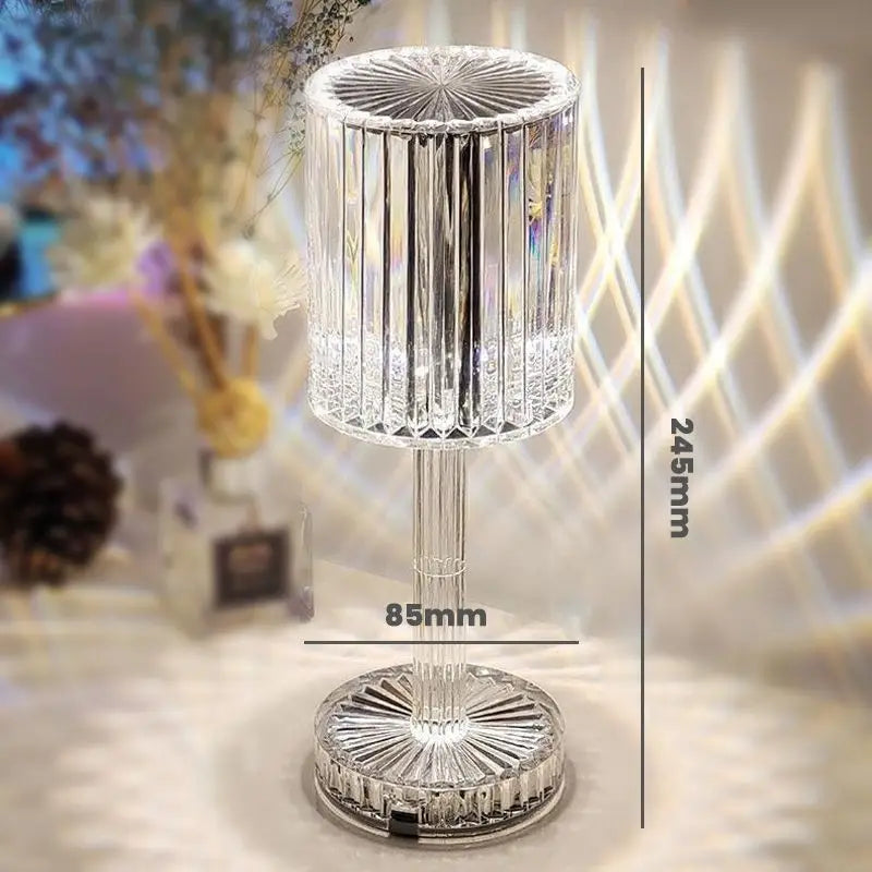 Clear crystal table lamp with vertical ridges and fluted base featuring a 3 way dimmable touch control night light function and elegant light-reflecting design.