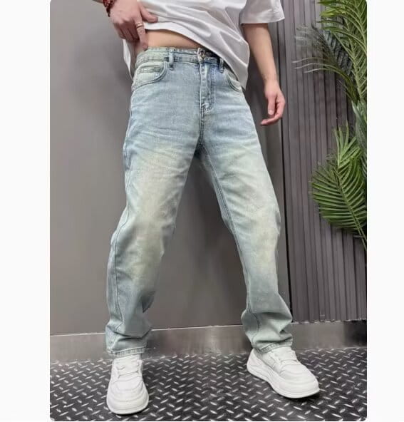 Men’s light wash denim jeans with a relaxed straight leg cut and subtle fading for a casual modern look.