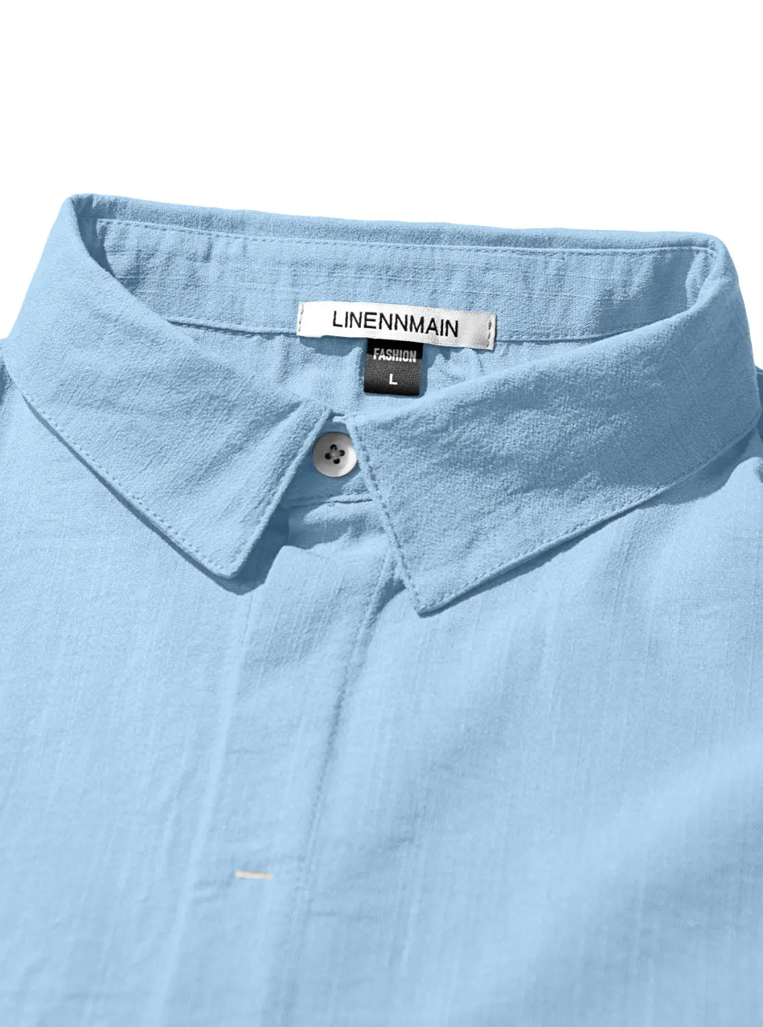 Men’s textured bamboo linen short sleeve button down shirt in light blue linen with a classic collar and button closure featuring a linenmain brand label.