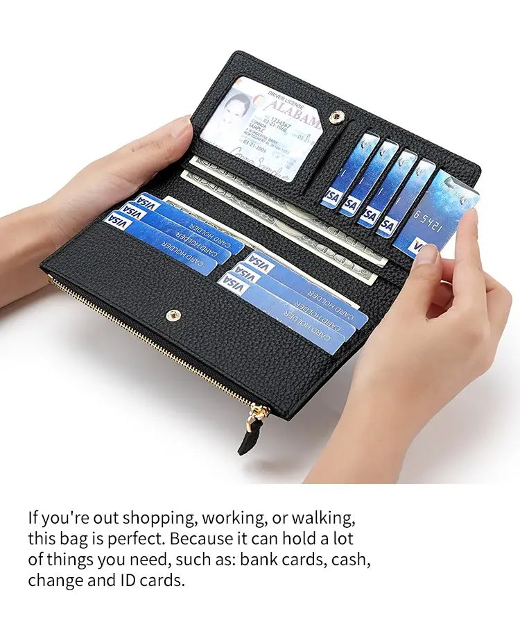Black cowhide leather anti theft RFID long zip wallet with gold-tone zipper and hardware featuring multiple card slots holding blue credit cards and a clear ID window.