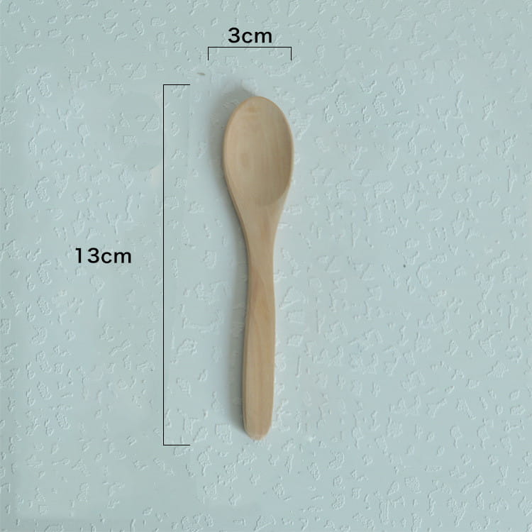 A light brown wooden spoon with a smooth natural finish measuring 13cm by 3cm from a wooden spoon set of natural eco-friendly kitchen utensils.