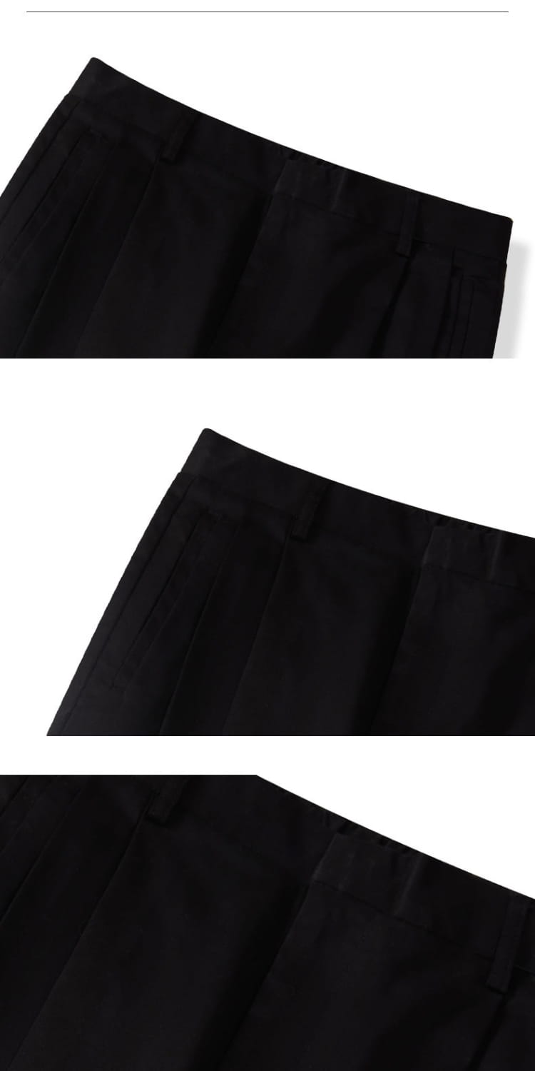 Pantalones de vestir anchos plisados color gris oscuro para hombre con diseño de falda plisada negra y cinturilla estructurada lisa y suave