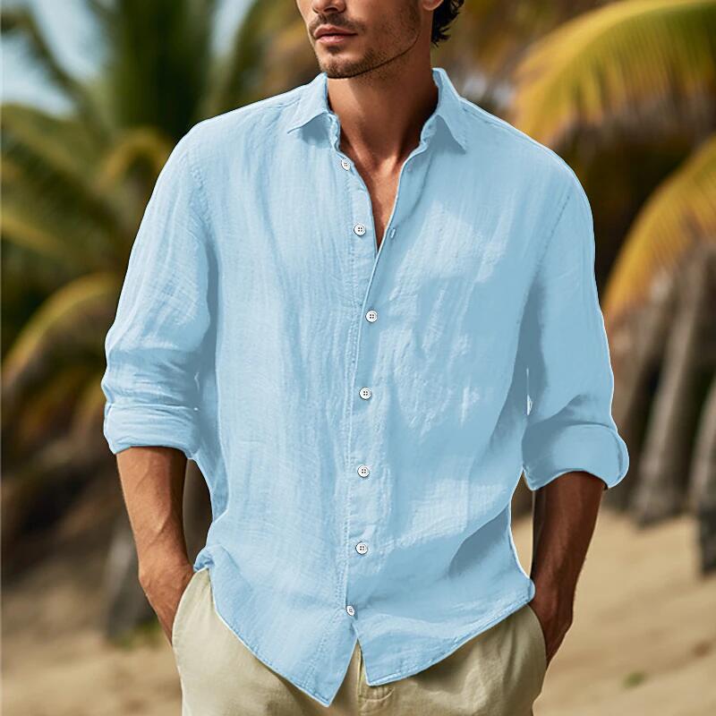 Men’s relaxed fit cotton linen long sleeve shirt in light blue with rolled-up sleeves.
