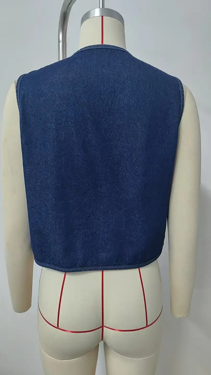 a dark blue denim sleeveless crop top with a simple design and straight hemline from the y2k bow tie collection