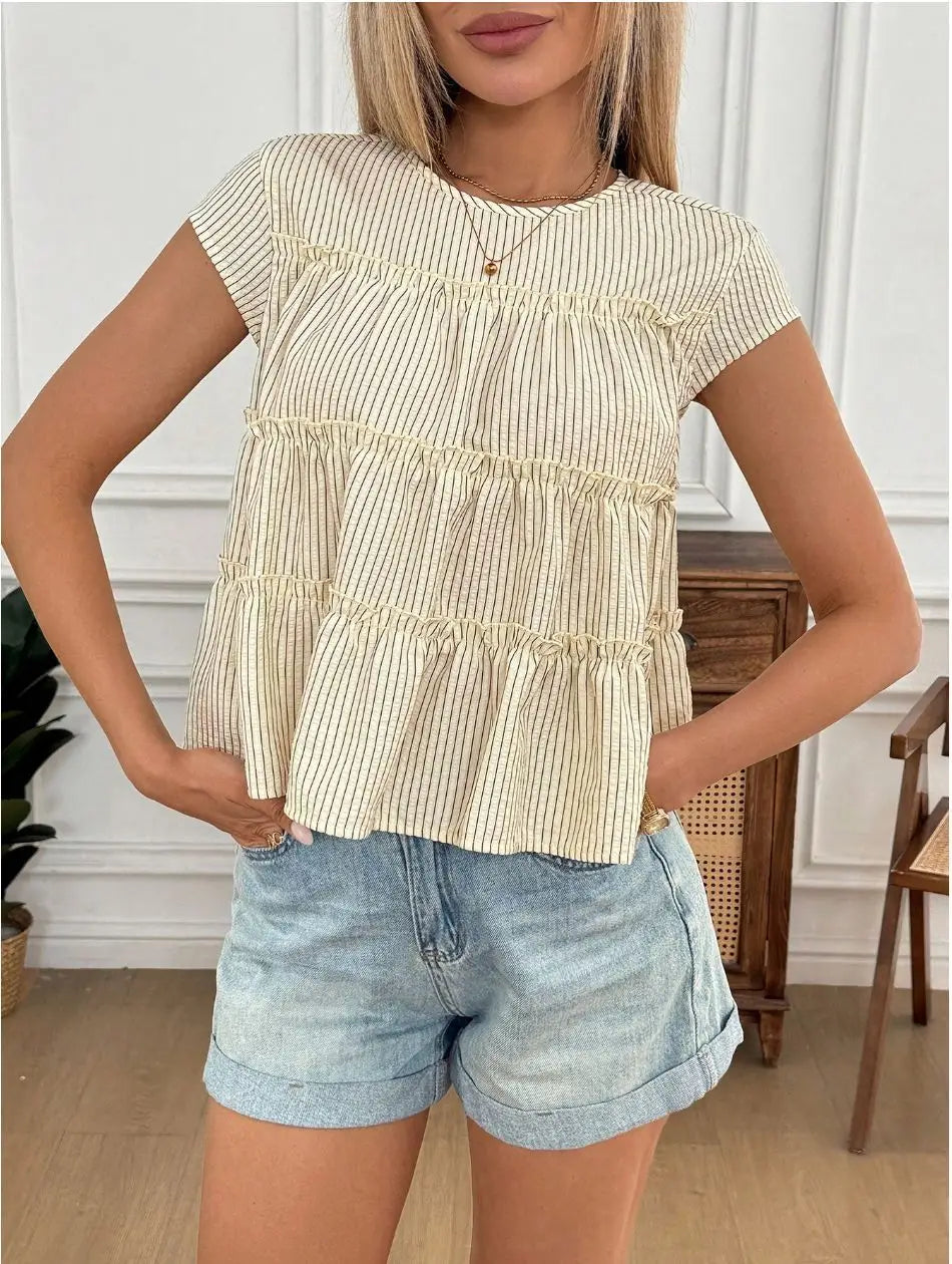 Cream-colored short-sleeved blouse with thin vertical stripes and tiered ruffles featuring a beige striped ruffle hem design.