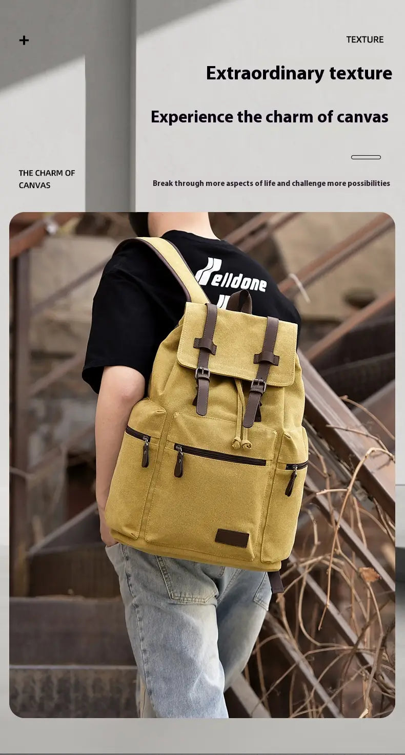 Yellow canvas men’s travel backpack with large 20-35l capacity and brown leather straps and zippers.
