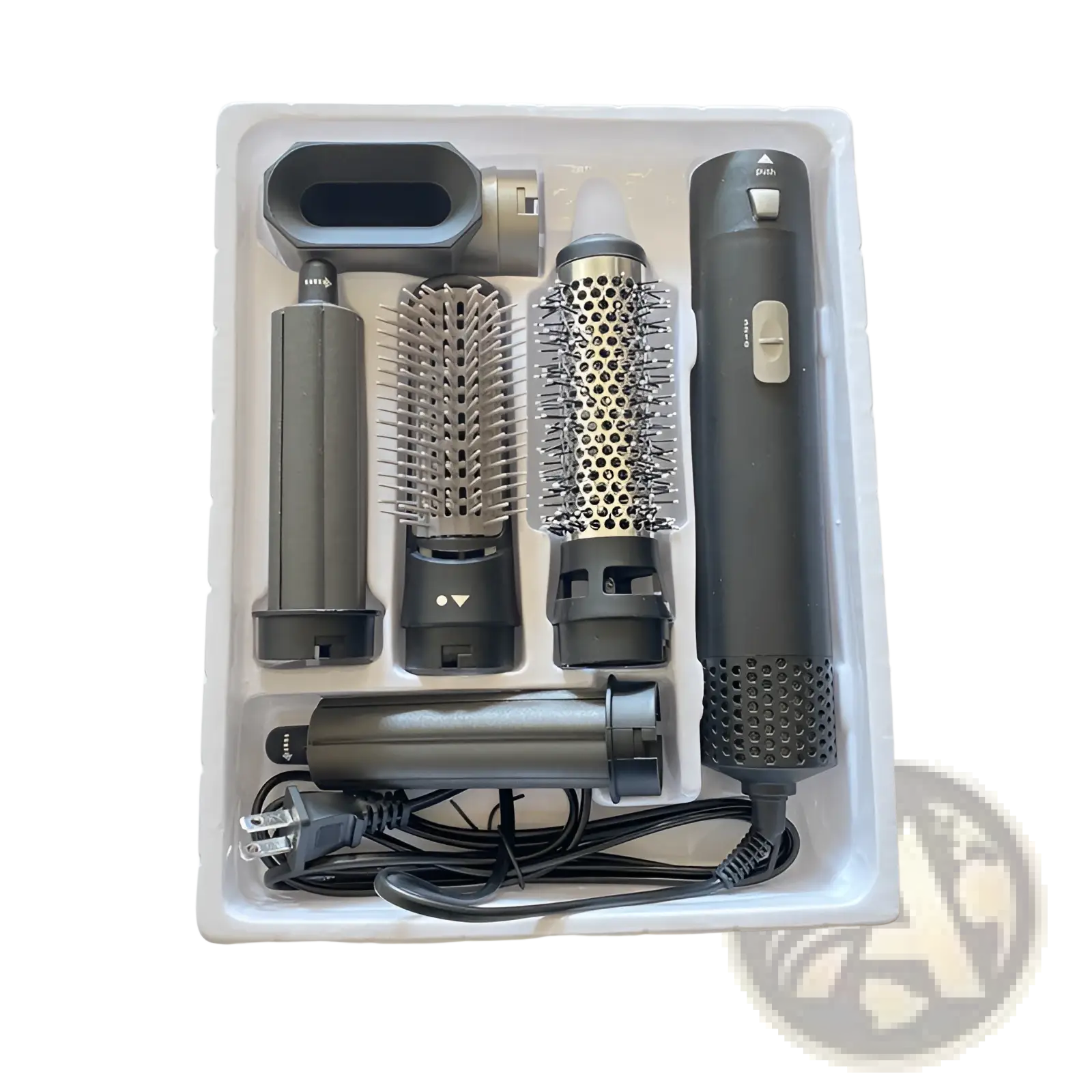 Black and silver 5-in-1 hot air comb hair dryer and styler set with multiple attachments for versatile styling