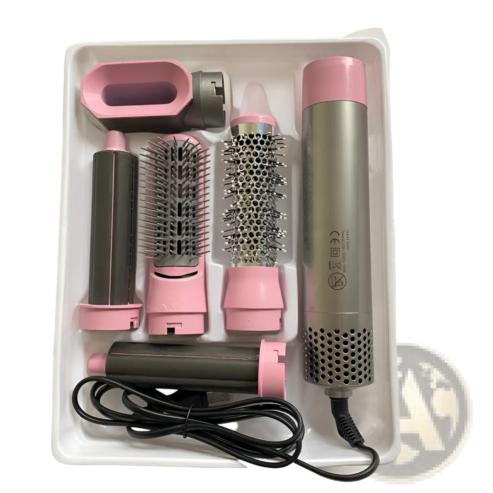 Pink and silver 5-in-1 hot air comb hair dryer and styler set with multi-functional attachments for versatile hair styling