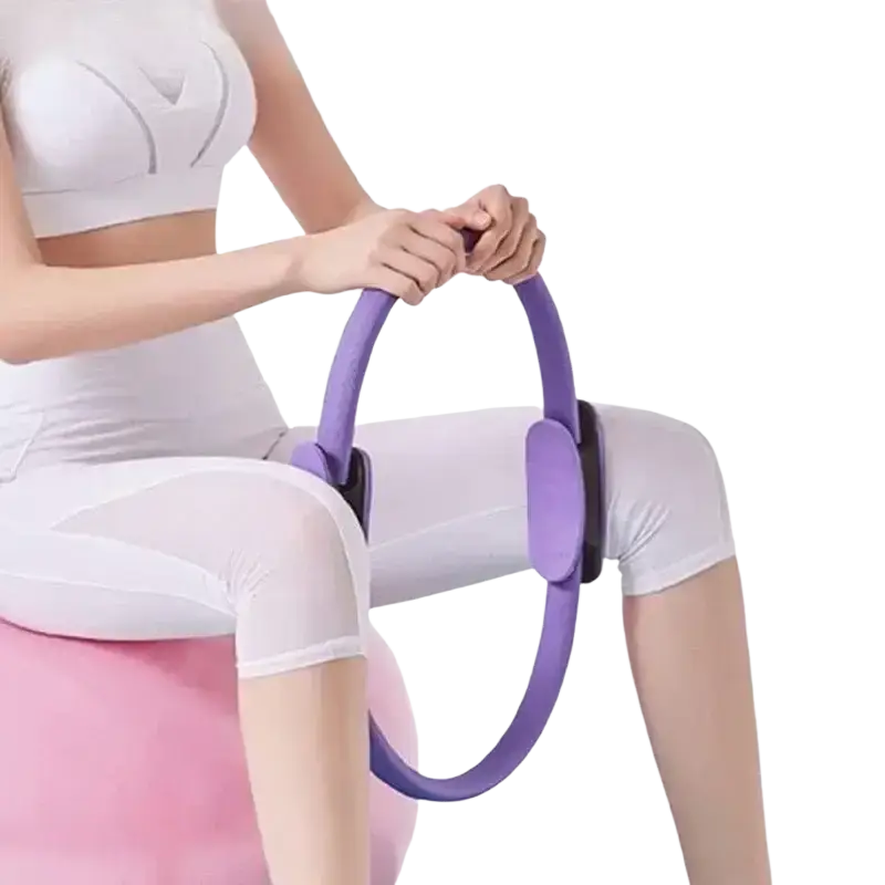 Purple pilates ring with soft flexible material and padded handles for comfortable grip in 5 piece resistance band set