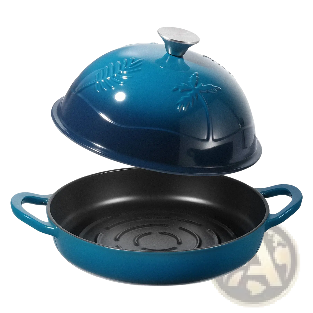 5 qt teal enameled cast iron dutch oven with domed lid embossed palm tree and leaf design and silver knob