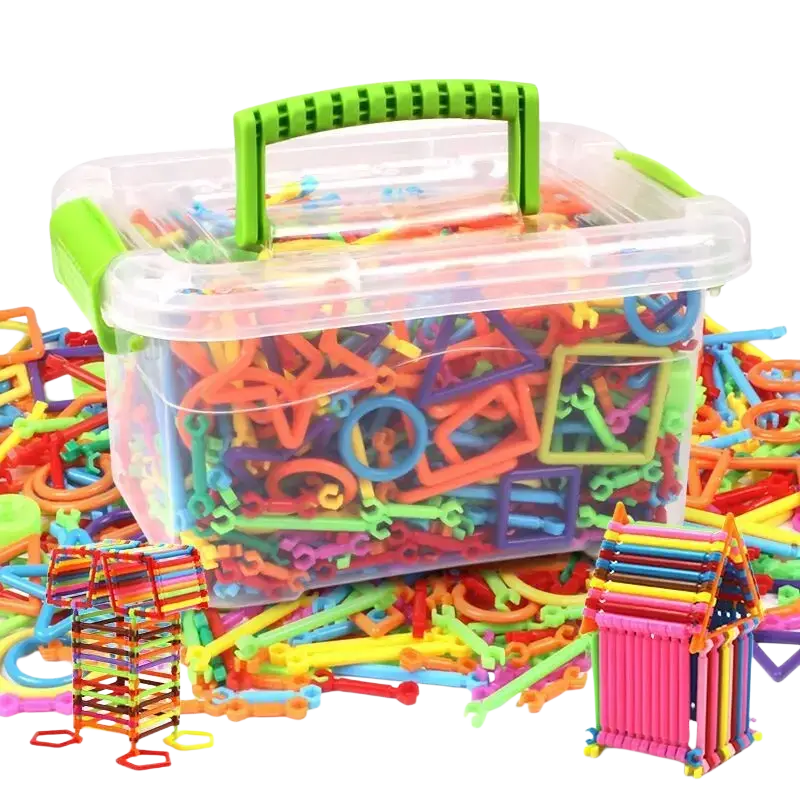 A clear plastic storage box with green handle filled with colorful magic wand interlocking building blocks toy set