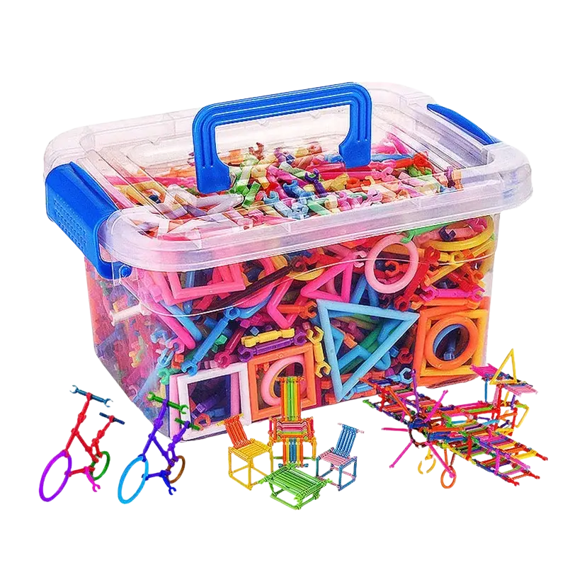 A clear plastic storage bin with a blue handle filled with colorful magic wand interlocking building blocks toy set