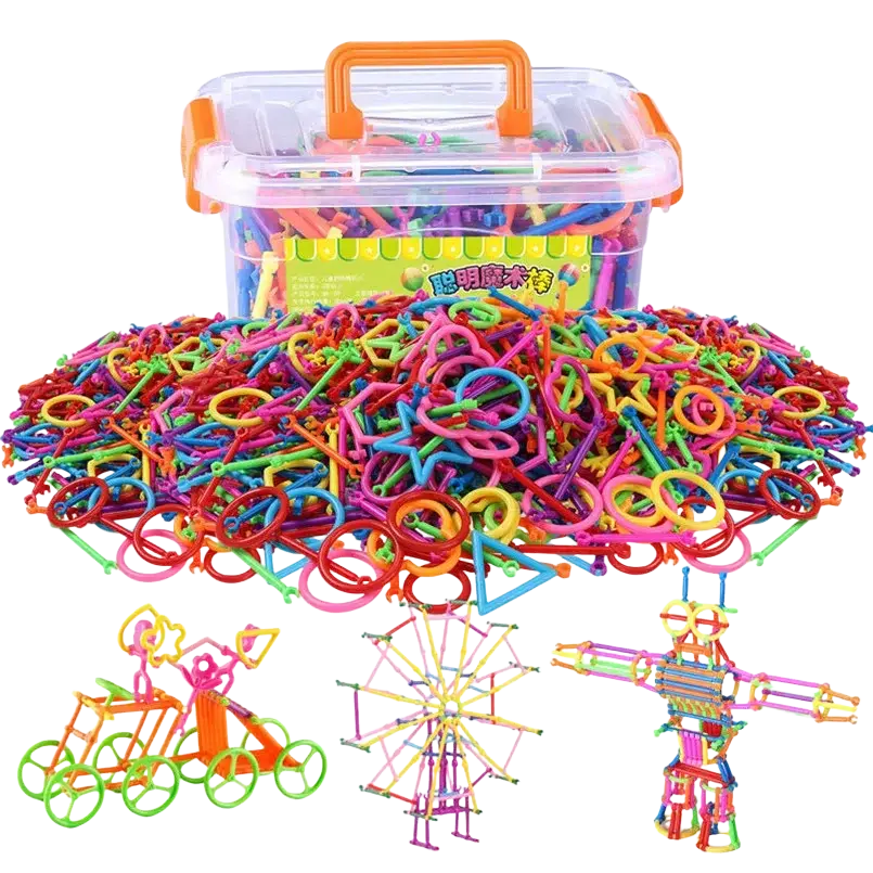 A vibrant multicolored plastic magic wand interlocking building blocks toy set with rings rods in a clear box with orange handle