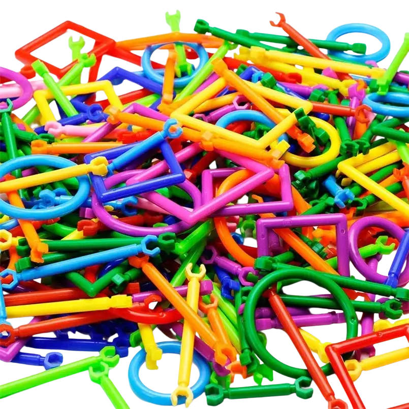 A vibrant pile of colorful plastic magic wand interlocking building blocks showcasing toy feature variety