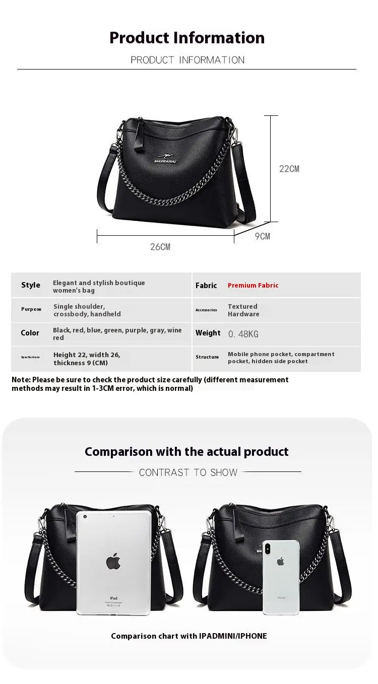 Black textured leather crossbody handbag with silver chain strap and silver hardware for women.