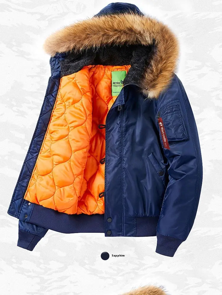 Navy blue quilted bomber jacket with a removable fur-lined hood and vibrant orange interior lining in plus size.
