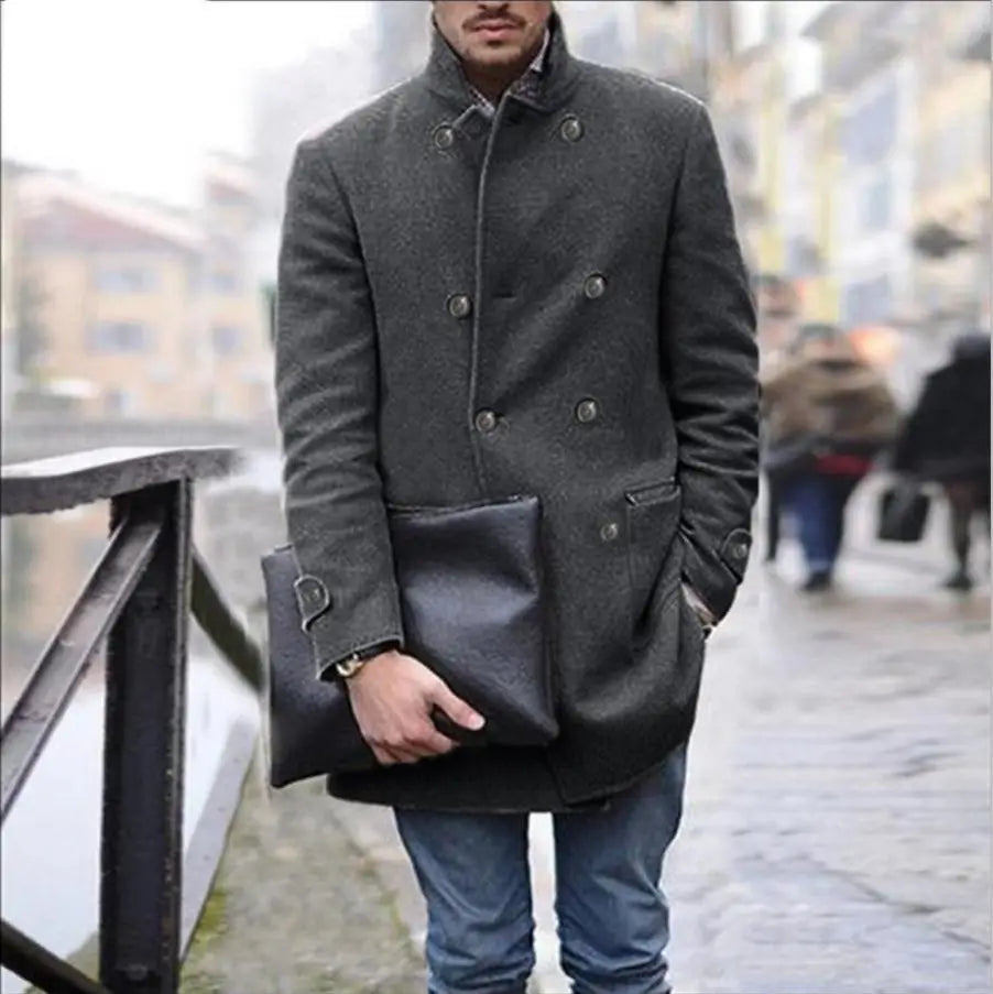 men woolen double breasted mid length coat in dark gray with black leather flap pockets and silver toned buttons