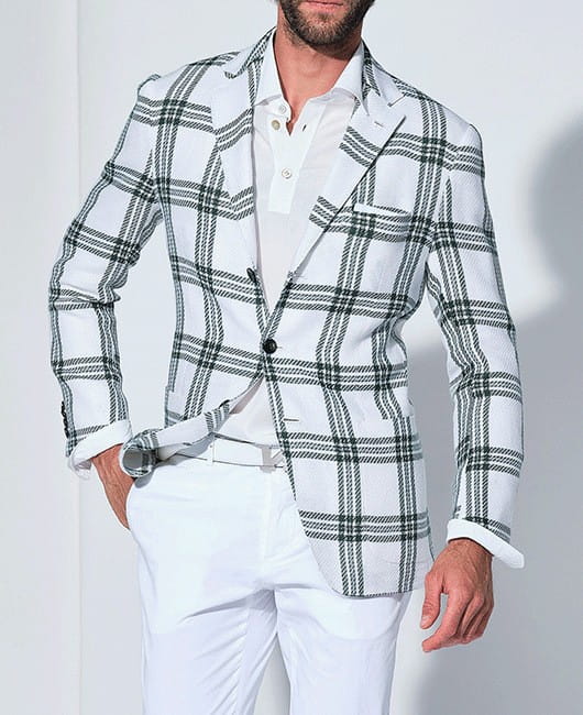 Veste de blazer à carreaux blanc et noir ajustée pour hommes, style business casual, avec une coupe sur mesure.