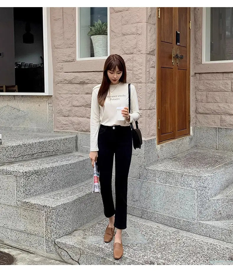 Schwarze Samtgefütterte High-Waist-Jeans-Leggings mit schwarzem High-Waist-Straight-Leg-Design für zusätzlichen Komfort und Stil
