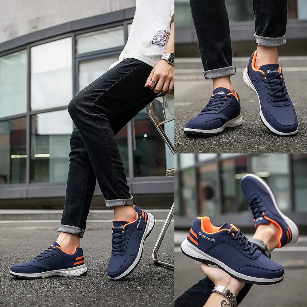 Navy blue and orange breathable mesh casual athletic sneakers with white soles designed for strong cavalry performance.