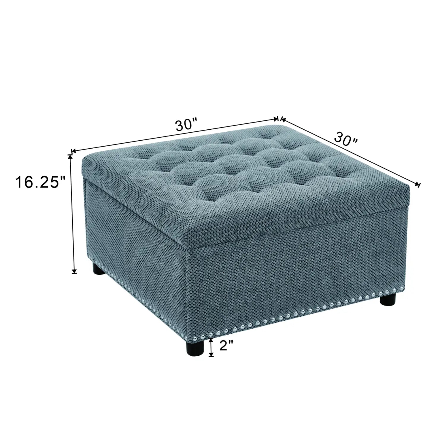 Gray tufted storage ottoman with textured fabric finish and decorative nailhead trim along the edges designed for versatile home storage.