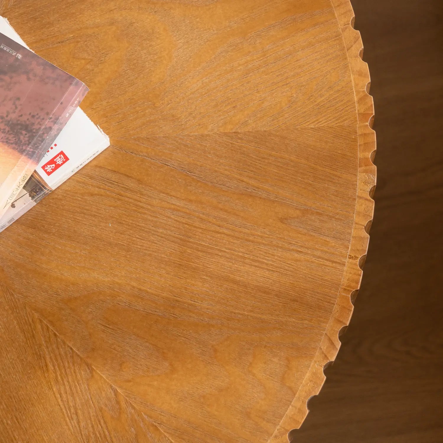 A 35.4 round retro coffee table with a scalloped fluted wood top and warm light brown wooden finish.