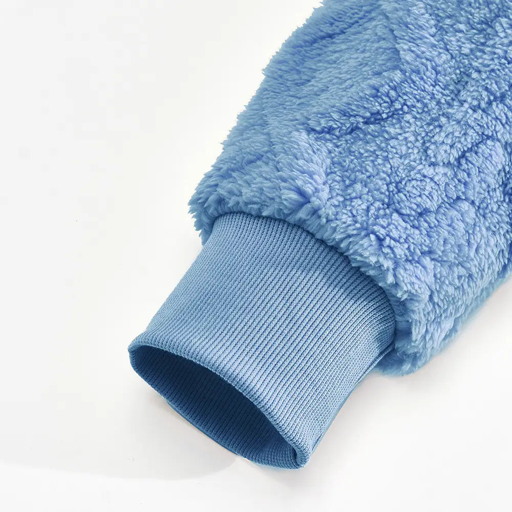 Light blue men’s textured fleece lined knit hoodie sleeve with fleece lining and ribbed knit cuff.