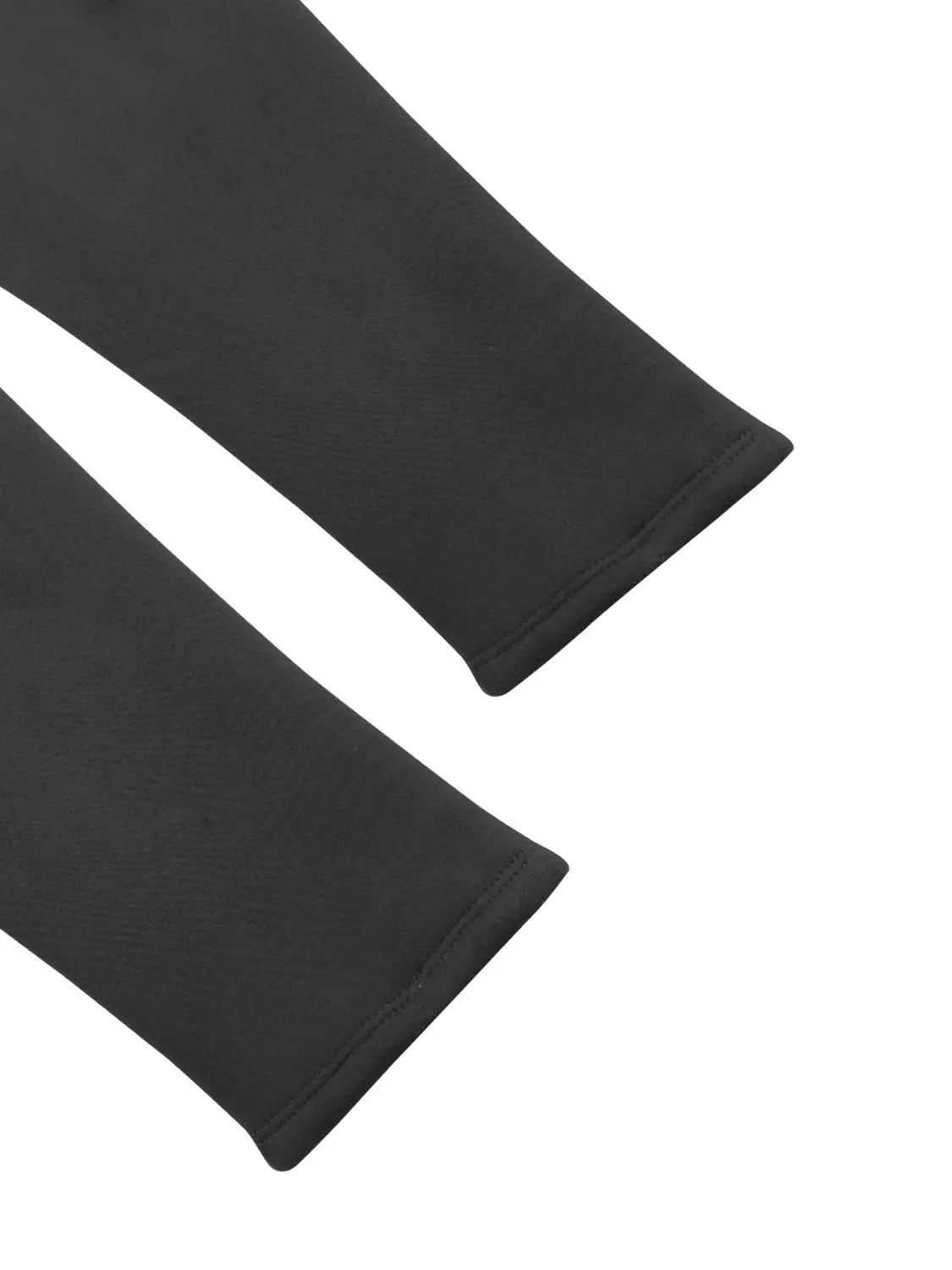 black stretchy fabric arm sleeves with neatly stitched hems complement fleece lined high waisted winter leggings designed for warmth and comfort.