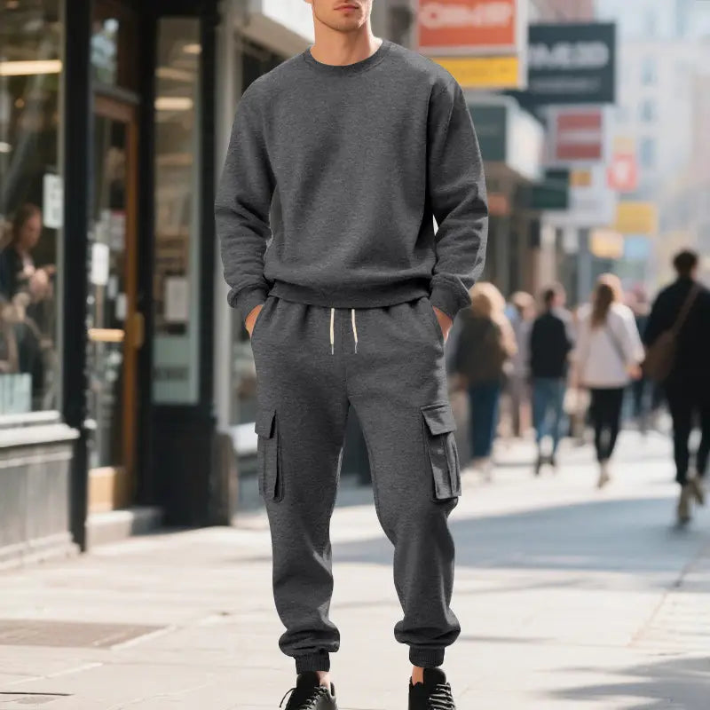 Gray heathered men fleece cargo sweatshirt and pants set with ribbed cuffs and waistband in a comfortable fleece material.