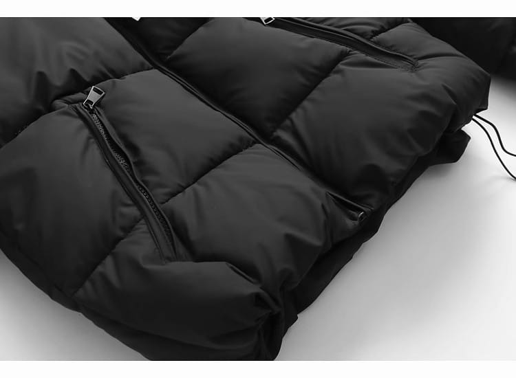 Black hooded puffer cotton coat featuring quilted panels and zipper pockets.