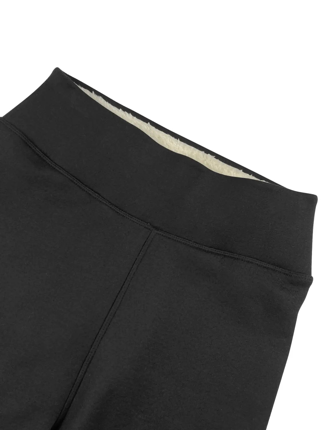 Black high waisted leggings with plush cream colored fleece lining designed for winter wear