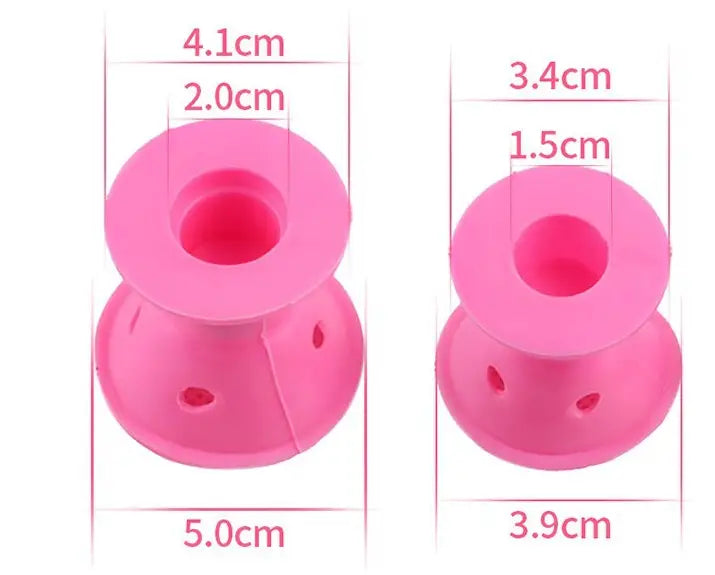 Pink silicone hair curlers no heat soft rubber rollers 10pc with one roller measuring 5.0cm and another 3.9cm in height featuring a central hole for securing hair.