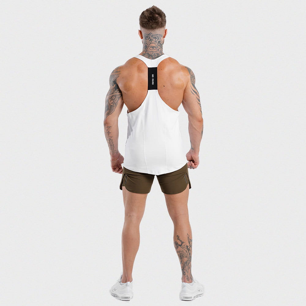 White men’s go hard racerback athletic tank top shown from the back with a black mesh panel and subtle branding for enhanced breathability and performance.