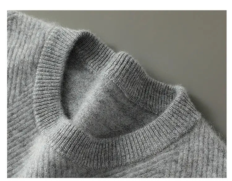 Men’s herringbone knit cashmere pullover sweater in soft heather gray with a ribbed knit and cozy textured finish.