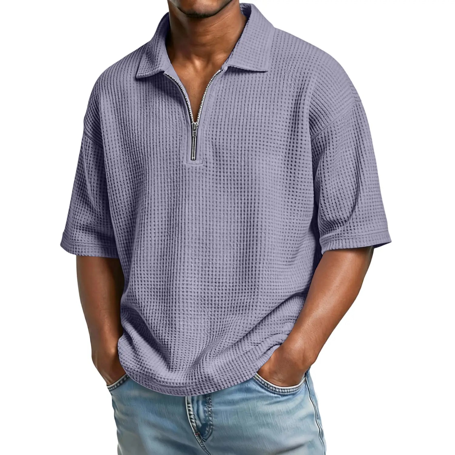 A lavender waffle knit men’s polo shirt with a half zip front and short sleeves.