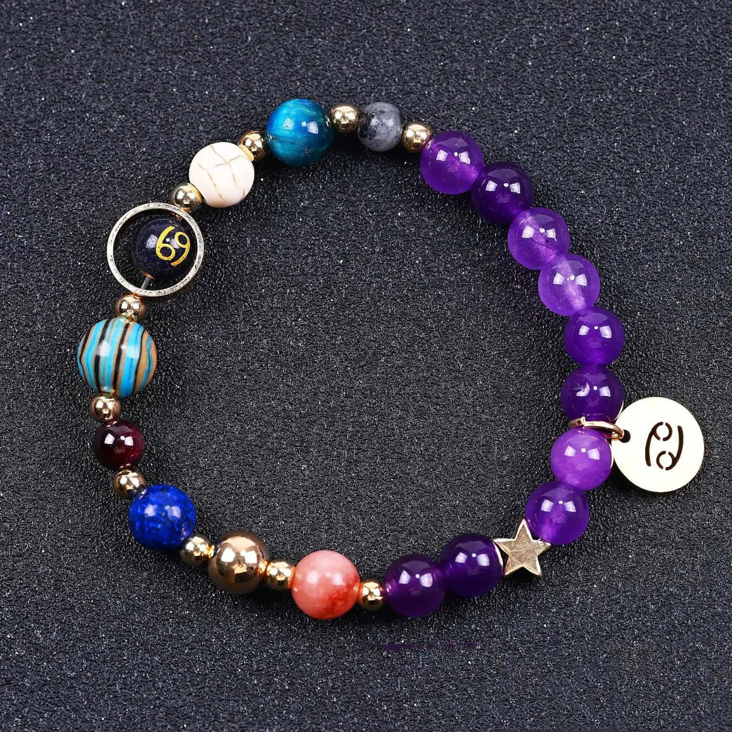 Natural amethyst and agate twelve zodiac beaded bracelet with colorful purple blue white and orange stones and gold-toned metal accents featuring zodiac-themed charms.