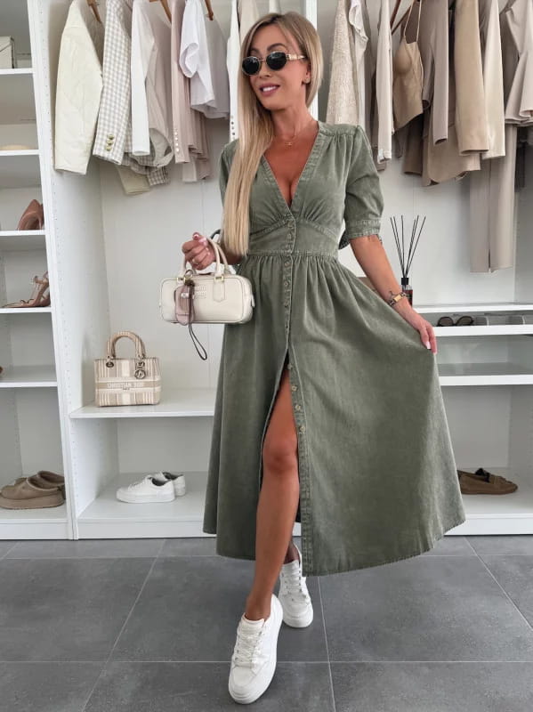 Olive green button-front denim midi dress with puffed sleeves and a high slit.