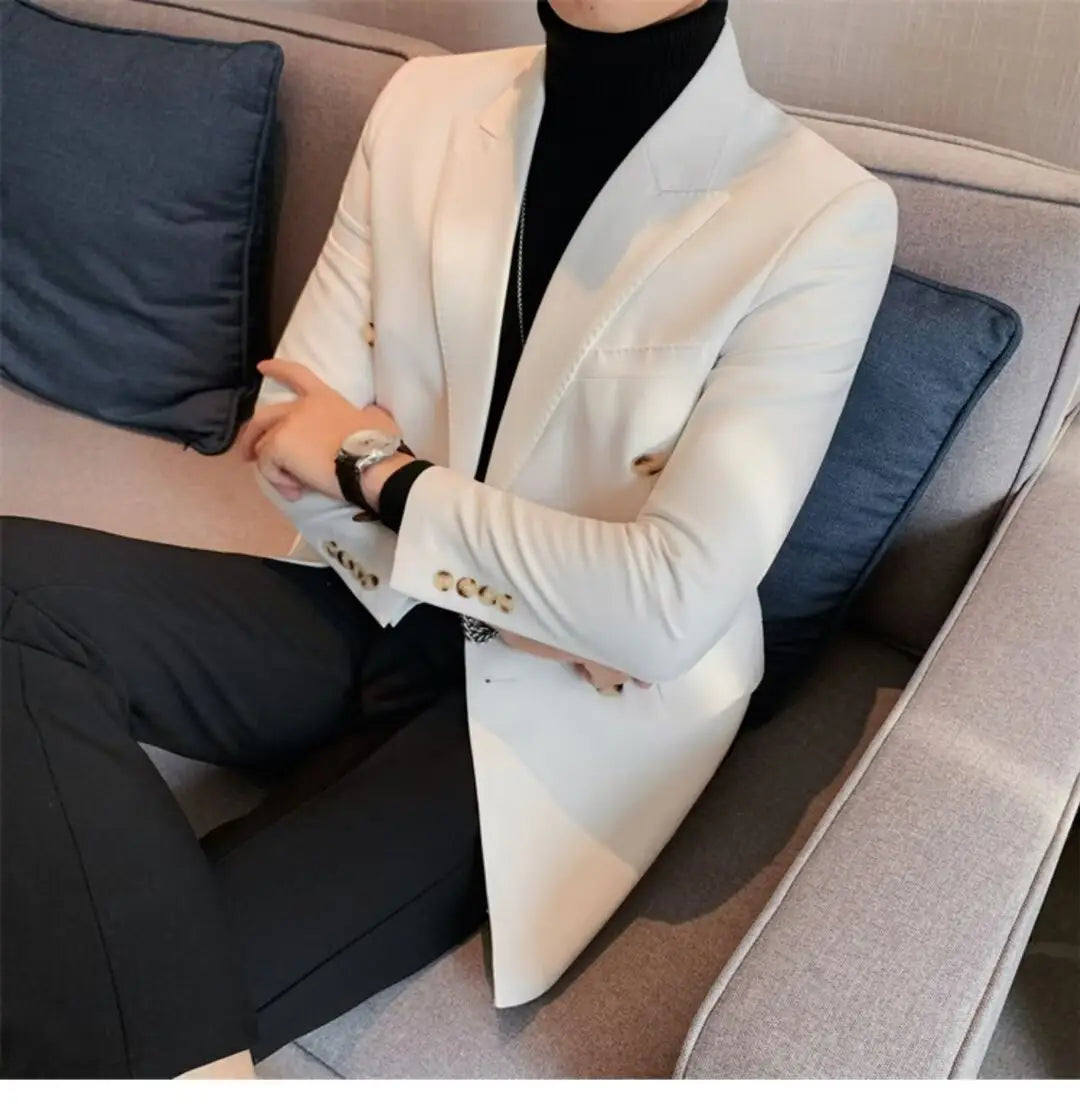 white double-breasted blazer with gold-tone buttons and a sleek tailored fit featured alongside a teal double-breasted corduroy jacket for men