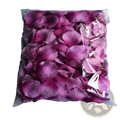 A bag of 5500 colorful artificial pink rose petals with a magenta to lavender gradient made of soft fabric for wedding decor