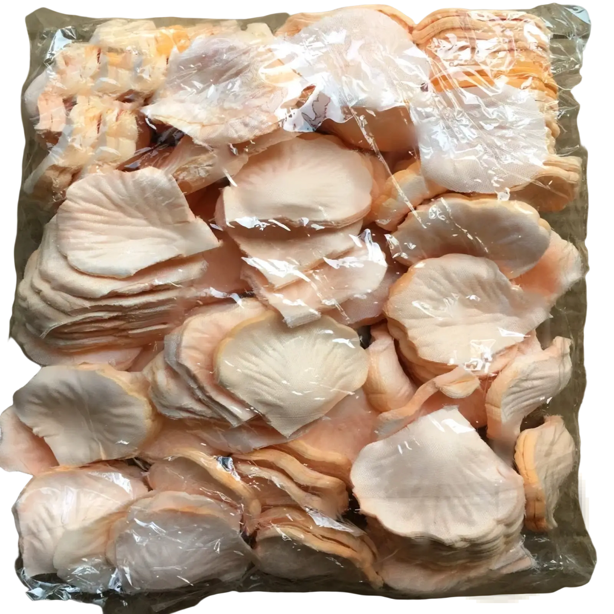A package of peach and cream artificial rose petals made from lightweight translucent material for wedding decor