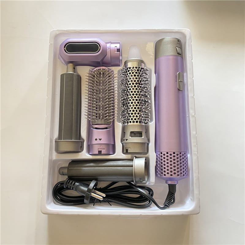 Purple and silver 5-in-1 hot air comb hair dryer and styler set with multi-functional attachments for versatile hair styling