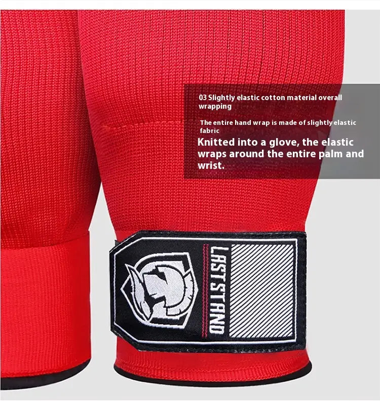Red knitted gel boxing hand wrap gloves in red with black and white last stand branded patch shown from the back side designed for fitness and boxing use.