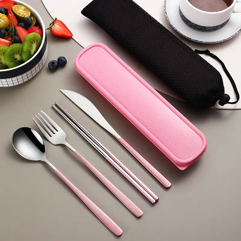stainless steel portable cutlery set featuring pink handles with matching pink silicone case and black drawstring pouch for easy transport and storage.