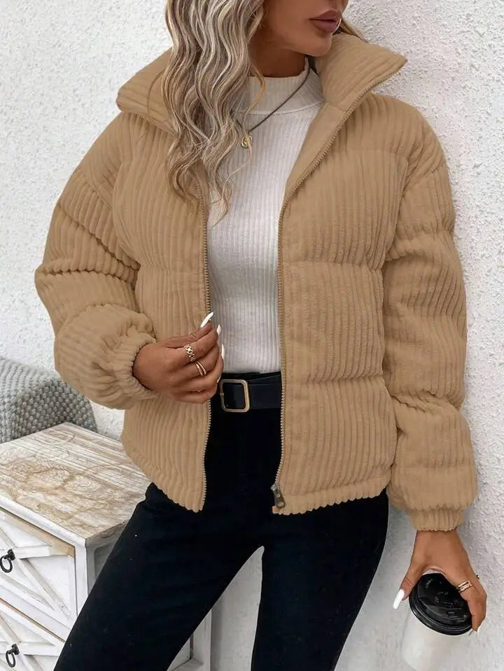 Beige corduroy puffer jacket with hood and zipper closure designed as a plus size women winter coat.