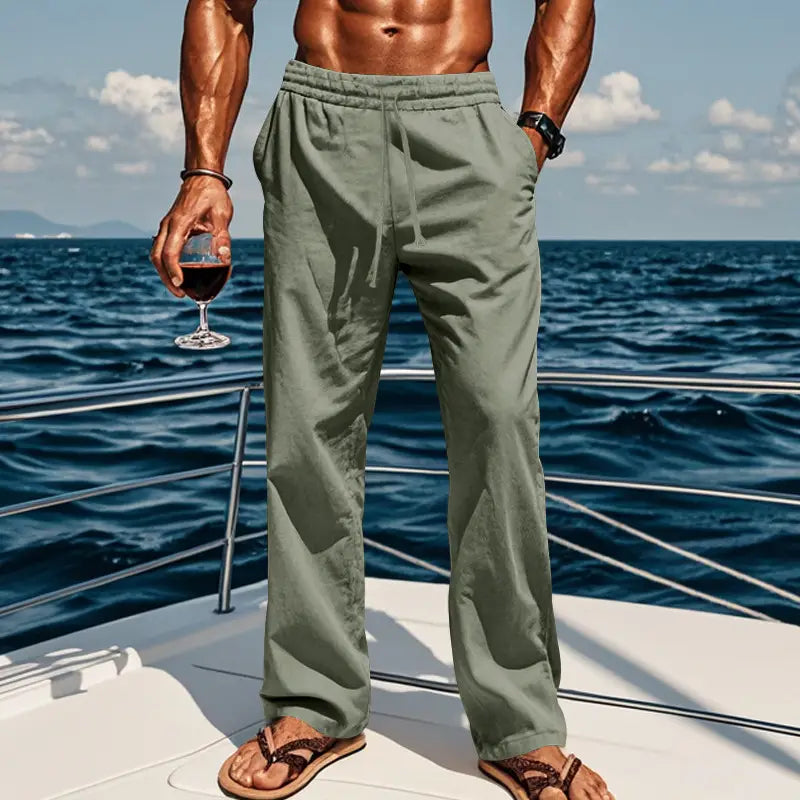 Men’s olive green linen joggers casual drawstring pants displayed from the front.