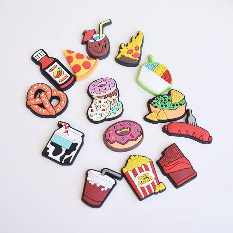 Colorful silicone food-themed shoe charms for sandals and clogs featuring various food designs.